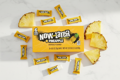 Now and Later Pineapple 24 pack marble flat lay with pineapple lifestyle