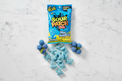Sour Patch Kids Blue Raspberry 8oz bag marble flat lay lifestyle