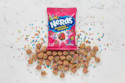 Nerds Gummy Clusters Rainbow 5oz marble flat lay with rainbow clusters lifestyle